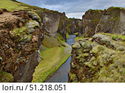 River in a basalt gorge, Iceland. Ofer Zidon / Stocktrek Images/TASS. Стоковое фото, агентство ТАСС / Фотобанк Лори