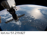 The Soyuz MS-12 spacecraft docked to the Rassvet module as the ISS flys above the Aegean Sea. Stocktrek Images, Inc./TASS. Стоковое фото, агентство ТАСС / Фотобанк Лори