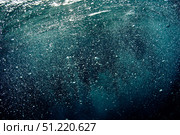 Bubbles rising from the deep against the blue in Komodo, Indonesia. Aaron Wong/Stocktrek Images/TASS. Стоковое фото, агентство ТАСС / Фотобанк Лори