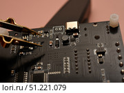 The SMD component tester. Investigation of the parameters of the SMD components using a tester probe. Стоковое фото, фотограф Valeriy Lushchikov / Фотобанк Лори