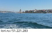Seagulls Flying Above Bosporus Strait in Istanbul Sailboat and yacht racing in the Bosphorus and the Sea of Marmara Bosphorus Strait in Istanbul, Turkey Beautiful view of the Bosphorus shore on a sunny day, full of residential houses, Istanbul, Turkey. A wide view of the Bosphorus Strait in Istanbul, with the city's skyline and coastal buildings in the background. A ship sails across the calm waters under the clear blue sky. Стоковое видео, видеограф Zita Khasanova / Фотобанк Лори