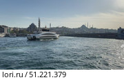 Dolmabahçe Palace waterfront view in Istanbul, Turkey, with Bosphorus Strait and cityscape in the distance. Summer sunny day with boats, seagulls, and blue water of the sea.Aerial drone ferryboat traveling Bosphorus Istanbul A wide view of the Bosphorus Strait in Istanbul, with the city's skyline and coastal buildings in the background. A ship sails across the calm waters under the clear blue skySeagulls soar above the ferry cruising the Bosphorus on a sunny day, Seagulls flying behind the ferry cruising Bosphorus in Istanbul, Turkey. Редакционное видео, видеограф Zita Khasanova / Фотобанк Лори