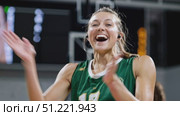 Victorious basketball player celebrating win, clapping enthusiastically and displaying energetic sportsmanship on court after successful match. Стоковое AI-видео, аниматор Юрий Поздников / Фотобанк Лори