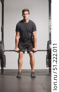 Muscular athlete lifting heavy barbell with perfect technique, displaying strength and concentration during intense workout in modern fitness facility. Стоковое AI-видео, аниматор Юрий Поздников / Фотобанк Лори