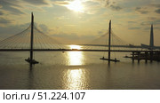 Cable-stayed bridge and new skyscraper at sunset. Стоковое фото, фотограф Михаил Коханчиков / Фотобанк Лори