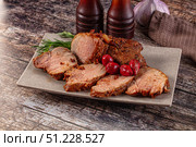 Baked pork sirloin with cornus. Стоковое фото, фотограф Андрей Старостин / Фотобанк Лори