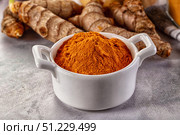 Indian tumeric cumin dry powder. Стоковое фото, фотограф Андрей Старостин / Фотобанк Лори