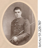 FRANCE - CIRCA 1930s-1935s : Vintage photo with French soldier in uniform in studio. Редакционное фото, фотограф Irina Kuchugurina/Gaudy / Фотобанк Лори