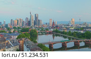Frankfurt am Main City Skyline Early Morning and Tram on Bridge. Aerial View. Стоковое видео, видеограф Максим Забаровский / Фотобанк Лори