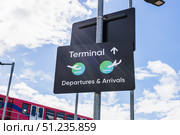 Airport Terminal Wayfinding Sign for Departures and Arrivals, Arrow and Plane Icons. Стоковое фото, фотограф Zydrius Tartenis / Фотобанк Лори