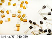 Bipolar transistors on a white background. Semiconductor devices. Microelectronics. Стоковое фото, фотограф Valeriy Lushchikov / Фотобанк Лори
