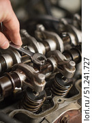 adjusting the valves of cylinder head. Стоковое фото, фотограф Енваев Андрей / Фотобанк Лори