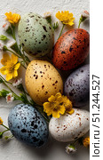 Colorful Speckled Eggs Surrounded by Wildflowers Arranged for Spring Celebration. Стоковое AI-изображение, AI-художник Юлия Гапеенко / Фотобанк Лори