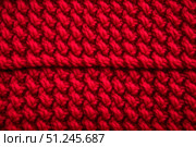 Red knitted winter sweater Background, red texture. Стоковое AI-изображение, AI-художник Irina Kuchugurina/Gaudy / Фотобанк Лори