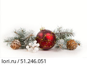 Christmas card with fir branches and Christmas decorations. Copy space. Стоковое фото, фотограф Ирина Толокновская / Фотобанк Лори