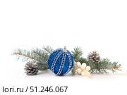 Christmas card with fir branches and Christmas decorations. Copy space. Стоковое фото, фотограф Ирина Толокновская / Фотобанк Лори