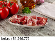 Italian Cured pork neck slices. Стоковое фото, фотограф Андрей Старостин / Фотобанк Лори