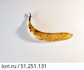 Photo of Overripe Banana on White Background. Стоковое фото, фотограф Константин Никитеев / Фотобанк Лори
