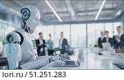 Futuristic humanoid robot with sleek design is working on a laptop in a modern office environment, showcasing advanced technology and collaboration among professionals. Стоковое AI-видео, аниматор Ирина Ручушкина / Фотобанк Лори
