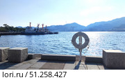 Nagasaki, Japan - May 12, 2025. Nagasaki port. Стоковое фото, фотограф Константин Никитеев / Фотобанк Лори