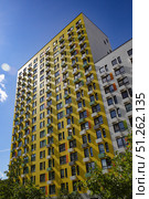 Facades of houses in the  new microdistrict called Buninskie Lugy ("BUNIN'S MEADOWS" HOUSING COMPLEX) of August 16, 2025, in Moscow, Russia. Стоковое фото, фотограф Ирина Вершинская / Фотобанк Лори