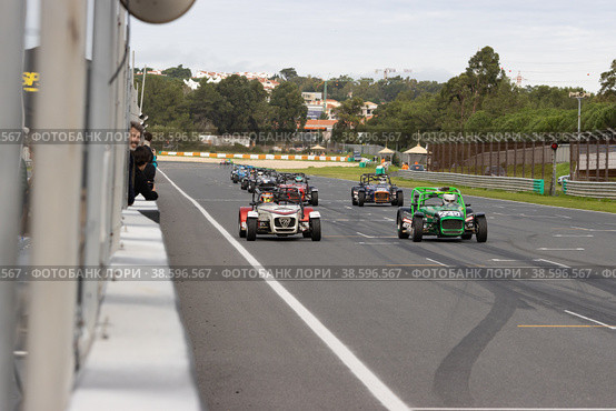 11-20-2022 PORTUGAL, LISBON: Caterham Festival - racing karts drive along the race track. Редакционное фото, фотограф Константин Шишкин / Фотобанк Лори