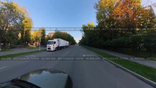 360 degree camera shooting while driving a car on a city street. The camera is above the roof of the car. Стоковое видео, видеограф Ярославский Максим / Фотобанк Лори