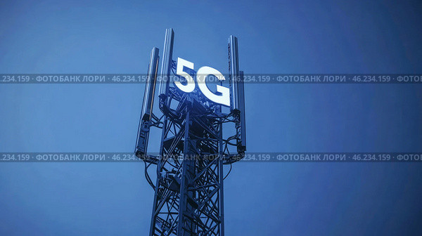 5G cell tower illuminated against a clear blue sky during evening hours. Стоковое AI-изображение, AI-художник Александр Довянский / Фотобанк Лори