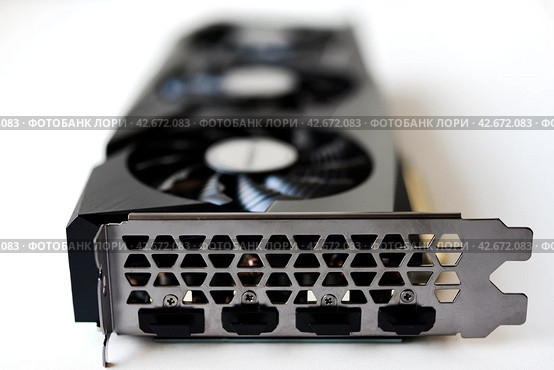 A black and white video card on a white background. Fans and the graphics card case. Computer accessories. Стоковое фото, фотограф Valeriy Lushchikov / Фотобанк Лори