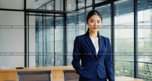 A businesswoman at a conference. An employee is in the meeting room. Стоковое AI-изображение, AI-художник Антон Слабоспицкий / Фотобанк Лори