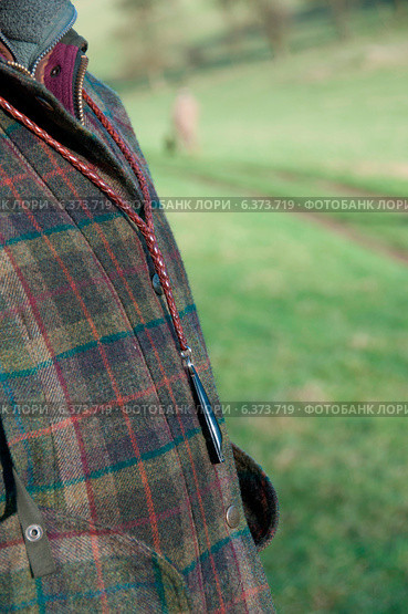 A close-up of a hunters jacket. Стоковое фото, агентство Ingram Publishing / Фотобанк Лори