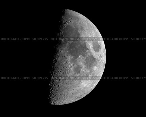 A closeup shot of a lunar eclipse isolated on a black background. Closeup shot of a lunar eclipse isolated on a black background. Стоковое фото, агентство Ingram Publishing / Фотобанк Лори