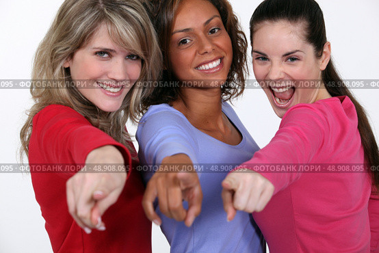 A group of young women pointing their fingers. Стоковое фото, агентство Ingram Publishing / Фотобанк Лори