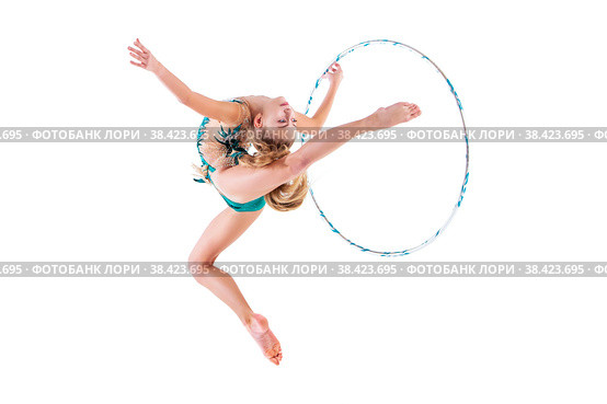 A gymnast girl in an emerald swimsuit performs an exercise with a hoop isolated on a white background. Стоковое фото, фотограф Мария Мороз / Фотобанк Лори