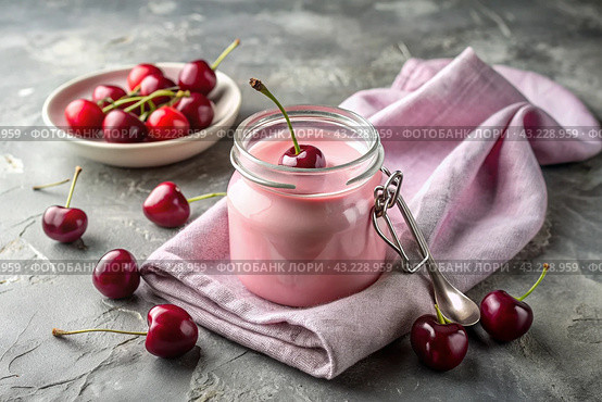 A healthy, healthy breakfast. Homemade cherry yogurt with fresh cherry berries, vintage spoon and towel on a stylish gray background. Стоковое AI-изображение, AI-художник Photojuli / Фотобанк Лори