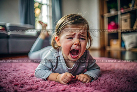 A little girl is lying on the floor. Childish hysteria. The child screams, sobs, gets cranky and gets hysterical. Discontent. Стоковое AI-изображение, AI-художник Photojuli / Фотобанк Лори