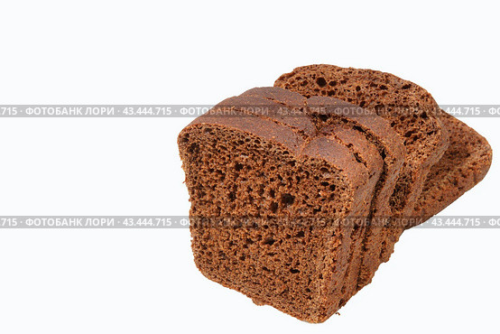 A loaf of rye bread on a white background. Close-up. Стоковое фото, фотограф Ярославский Максим / Фотобанк Лори