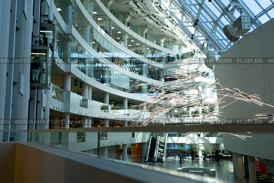 A Modern Architectural Marvel Showcasing Innovative Design, Open Spaces, and Natural Light Enhanced by Artistic Installations in a Contemporary Building. Стоковое фото, фотограф Владимир Федоров / Фотобанк Лори
