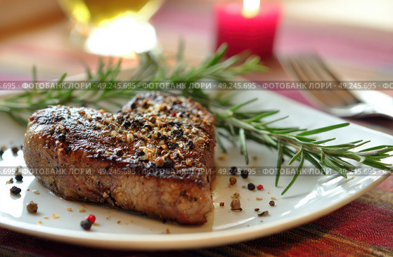 A piece of meat is on a white plate with some herbs and spices. Стоковое AI-изображение, AI-художник Ярославский Максим / Фотобанк Лори