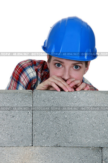 A terrified tradeswoman. Стоковое фото, агентство Ingram Publishing / Фотобанк Лори