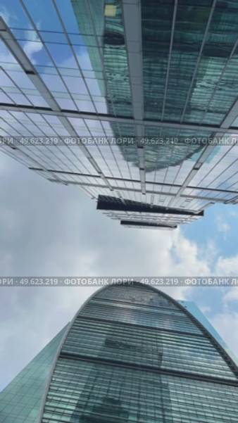 A timelapse with the towers of Moscow City against a sky with moving clouds. Natural landscape. Russia. Moscow. 12.06.25. Редакционное видео, видеограф Ярославский Максим / Фотобанк Лори