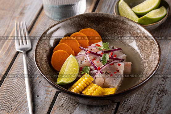 A traditional Peruvian dish is ceviche with white fish. Стоковое фото, фотограф Наталья Угрюмова / Фотобанк Лори