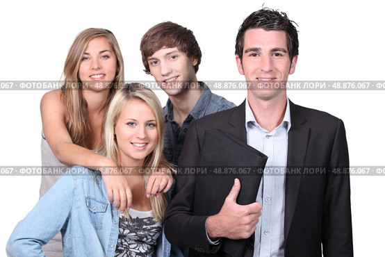 Adult and teenagers smiling. Стоковое фото, агентство Ingram Publishing / Фотобанк Лори