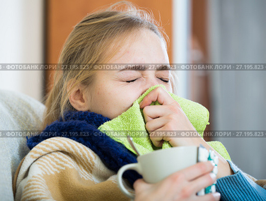 Adult female under blanket with flu attack indoors. Стоковое фото, фотограф Яков Филимонов / Фотобанк Лори