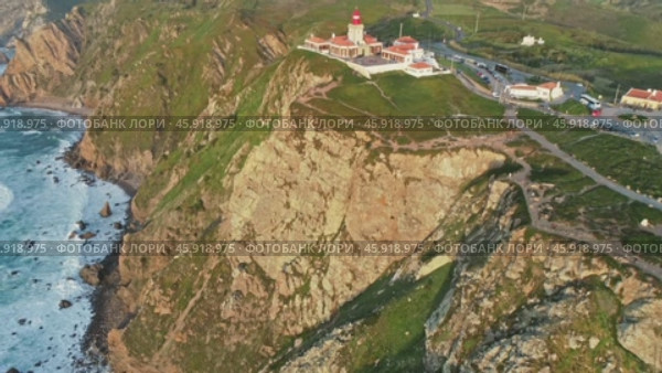 Aerial view of lighthouse at Cape Roca in Portugal (2019 год). Стоковое видео, видеограф Михаил Коханчиков / Фотобанк Лори