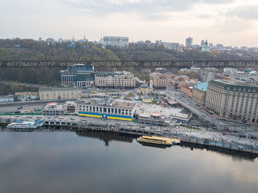 Aerial view of River Port, Podil and Postal Square in Kiev the capital of Ukraine. Podil is one of the oldest neighborhoods of Kiev. Drone photo. view of Podil, River station and the river Dnieper in Kyiv, Ukraine. Стоковое фото, агентство Ingram Publishing / Фотобанк Лори