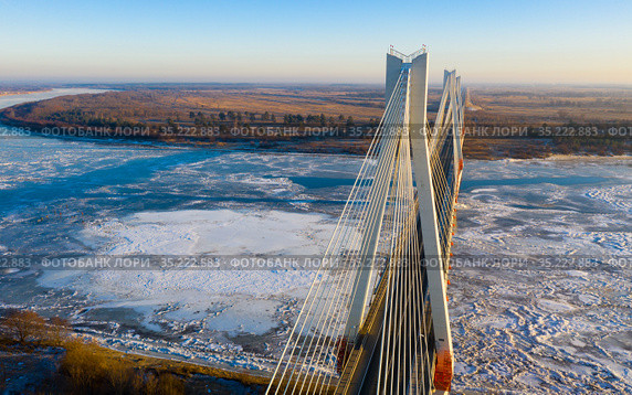 Aerial view of the cable-stayed Murom bridge over the Oka river. Стоковое фото, фотограф Яков Филимонов / Фотобанк Лори