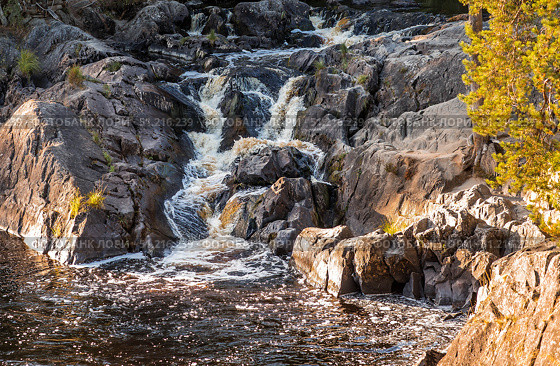 Akhinkoski Waterfalls or Ruskeala Waterfalls on the Tohmajoki River. Russia, Republic of Karelia. Стоковое фото, фотограф Photojuli / Фотобанк Лори