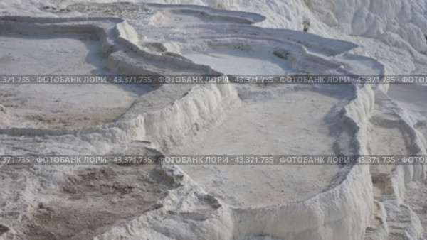 Amazing landscape of Pamukkale thermal springs with cascade of white calcite terraced baths, Turkey. Стоковое видео, видеограф Яков Филимонов / Фотобанк Лори