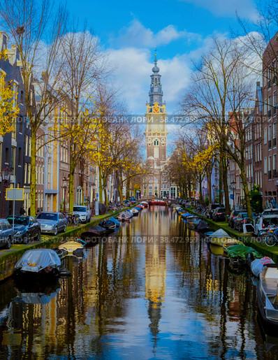 Amsterdam Netherlands canals with lights during evening in December during winter in the Netherlands. Стоковое фото, фотограф Fokke Baarssen / Фотобанк Лори